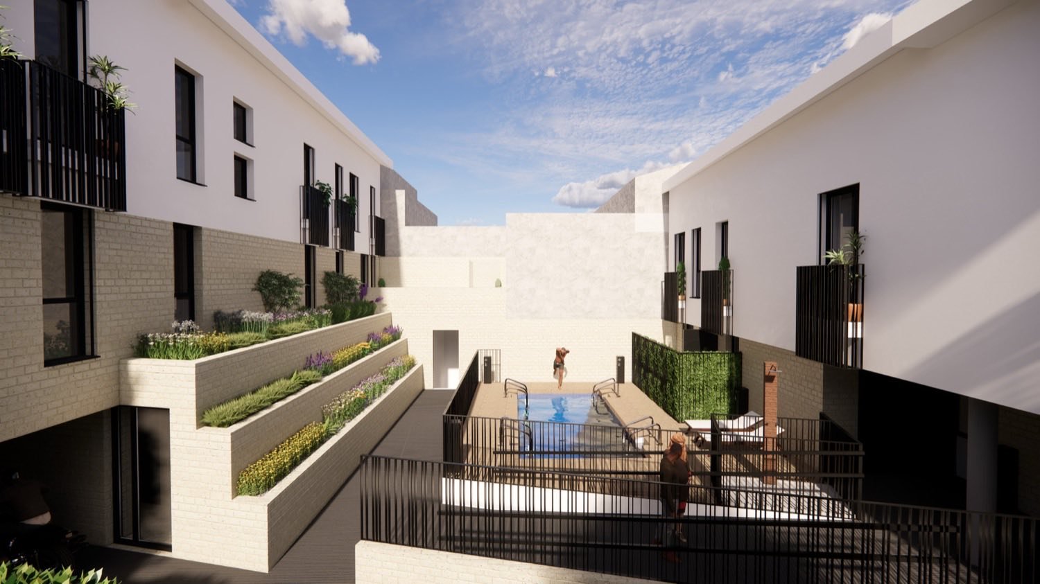 Patio interior del Residencial Moncayo con la piscina comunitaria y jardineras escalonadas.